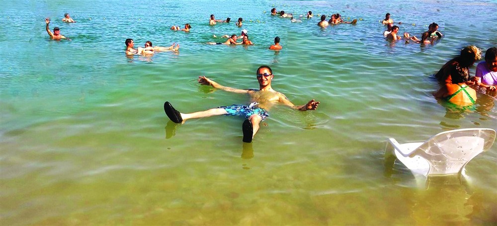 Eric Goldberg floats in the Dead Sea.